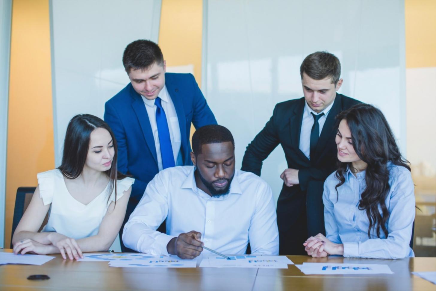 Professional business consultation meeting discussing financial planning strategies